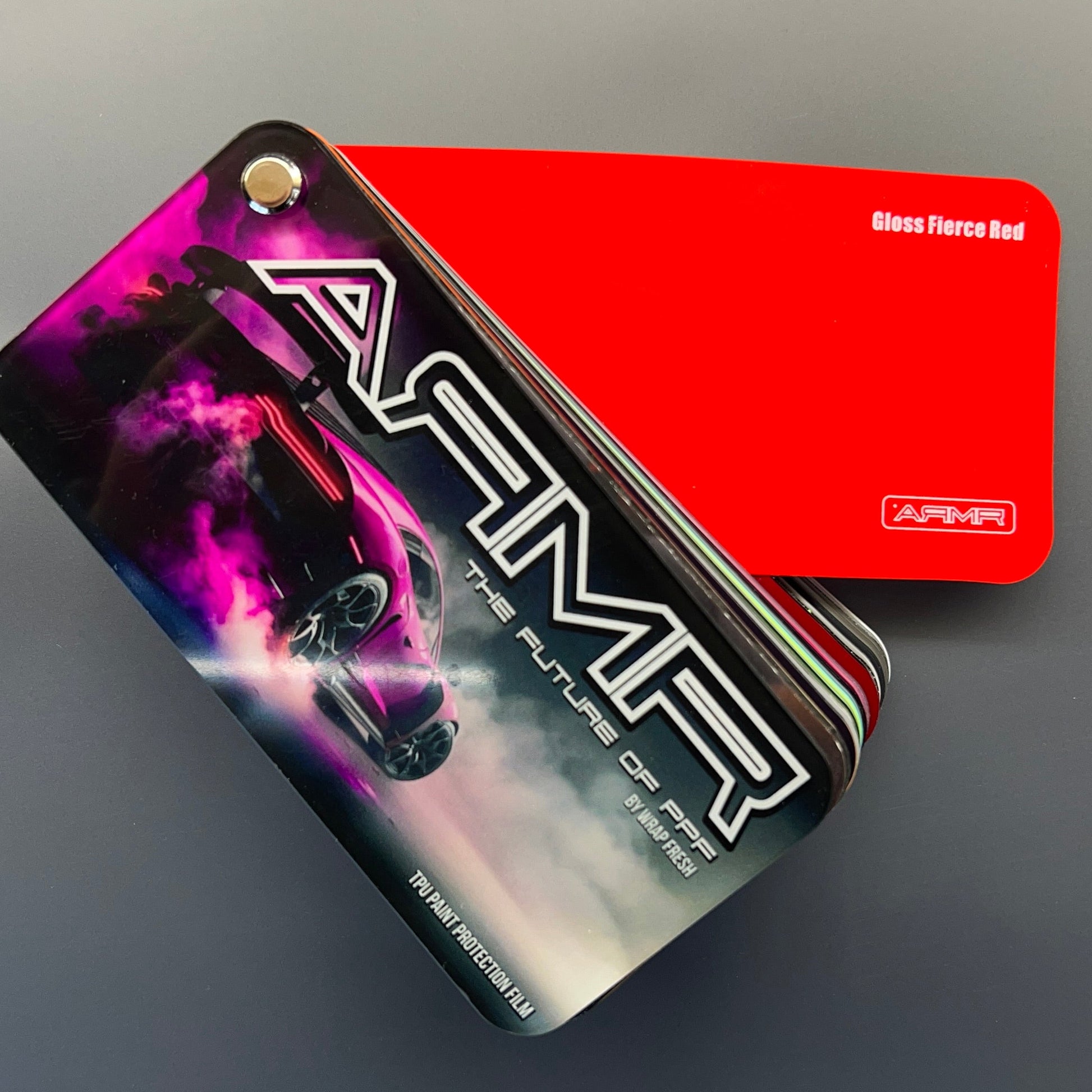 ARMR Color Swatches Book Displaying a Gloss Fierce Red color swatch.