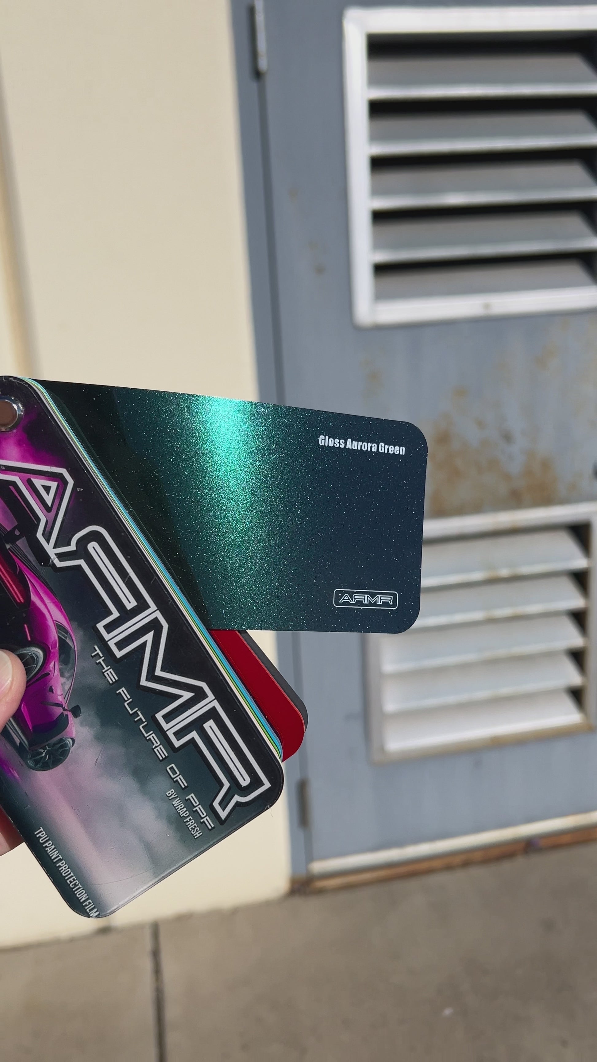 A short video showing the color shifting film in the sun change from green to purple.