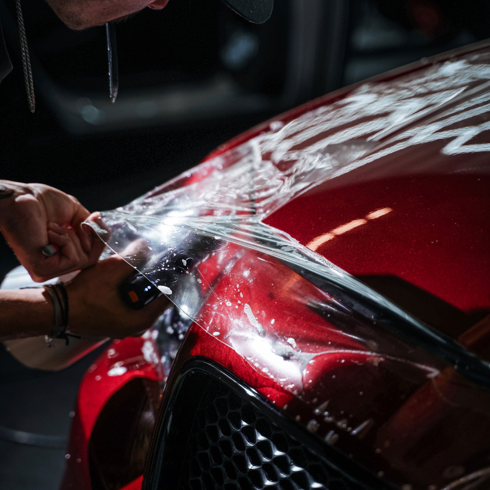 Installing glossy PPF on a red car