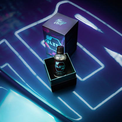 Bottle of ELITE Ceramic Coating in a box on a neon blue background.