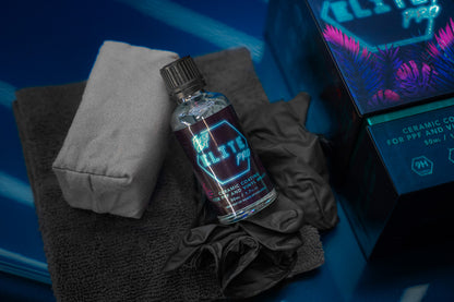 Bottle of 'Elite' product on a towel with a blue background