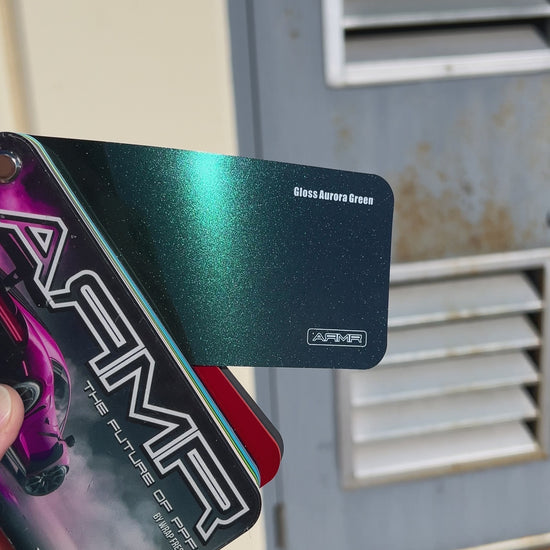 A short video showing the color shifting film in the sun change from green to purple.